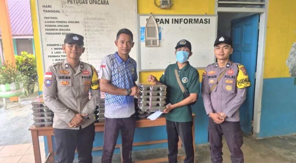 Kawal Distribusi 1.554 Porsi Makan Bergizi Gratis, Polsek Daik Lingga Pastikan Tepat Sasaran
